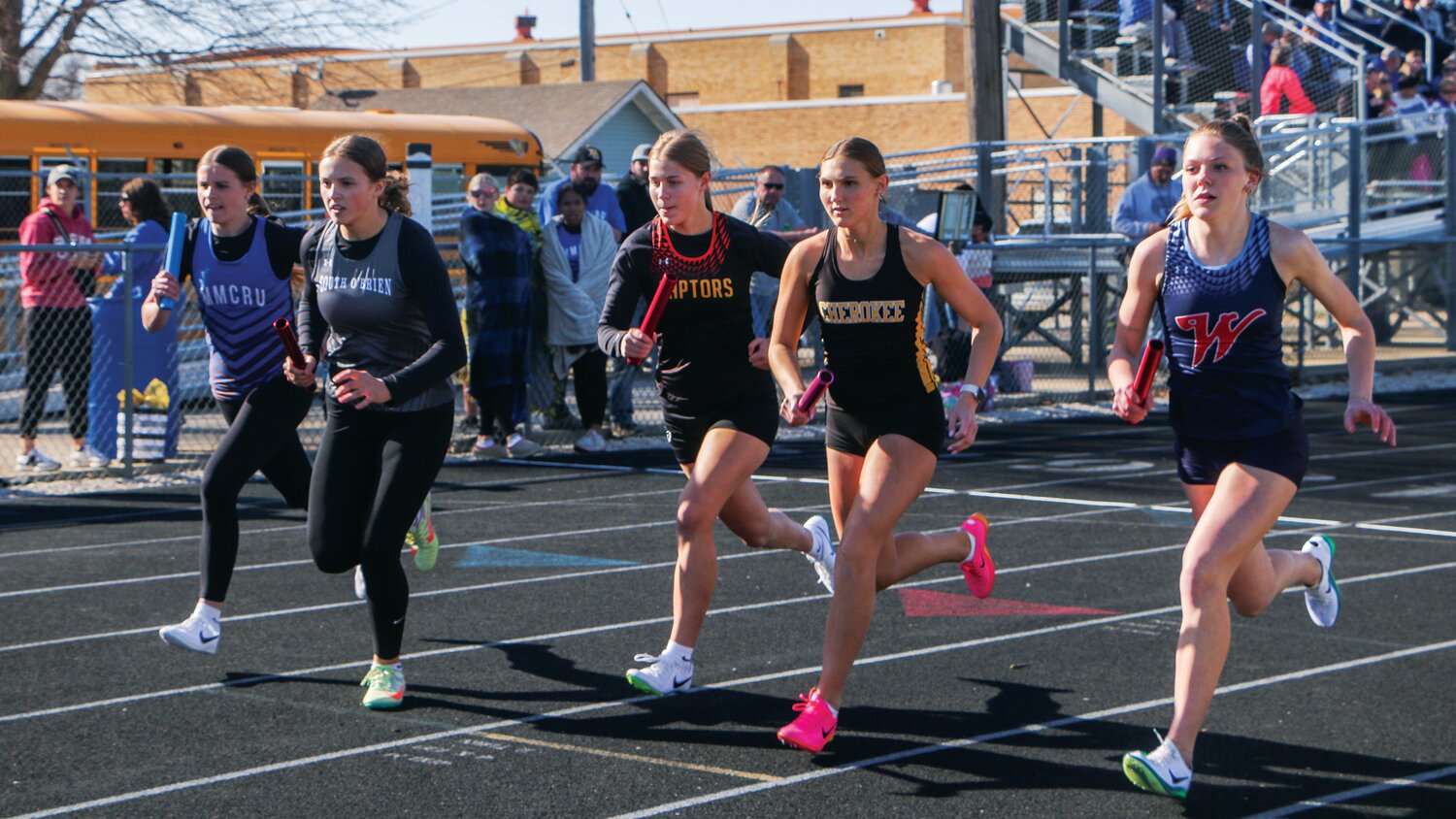 From left, MMCRU’s Hailey Staab, South O’Brien’s Reese Farquhar, Ridge View’s Jayna Aschinger, Cherokee’s Grace Woodall and Alta-Aurelia’s Breyer Anderson take off to start the 4x800 meter relay at the Russ Kraai Relays in Holstein on Tuesday.