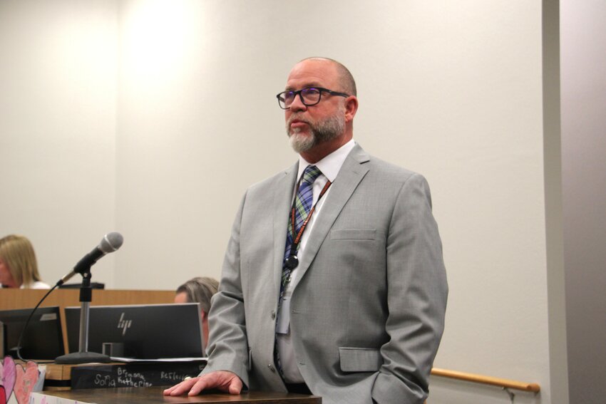 Springtown Independent School District Superintendent Shane Strickland speaks at the podium during the January 2024 school board meeting.