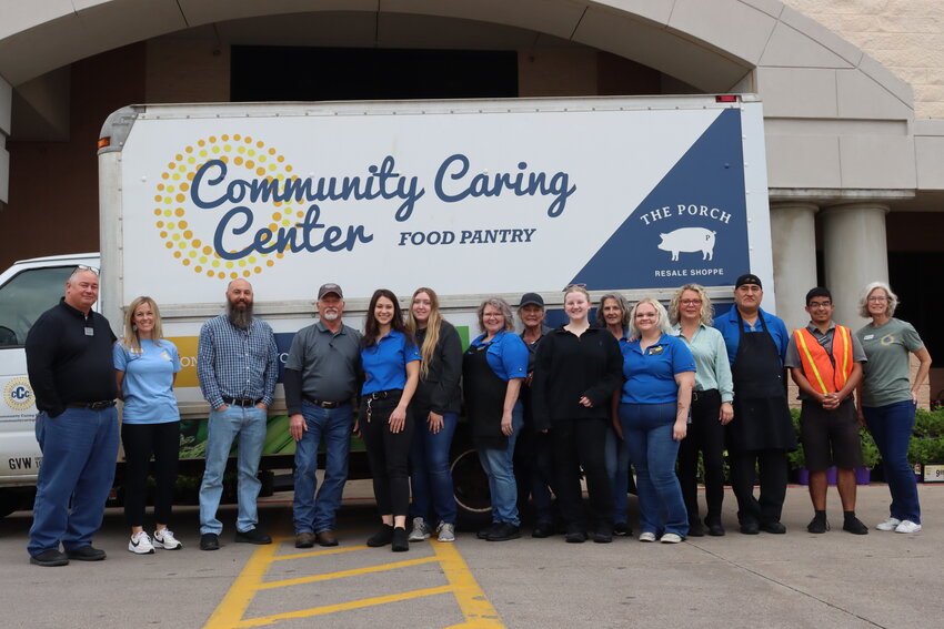 The Azle Albertsons team along with CCC directors Kristie Cooper and Bonnie Monninger in front of the CCC truck and Azle’s Albertsons at 480 NW Pkwy St.