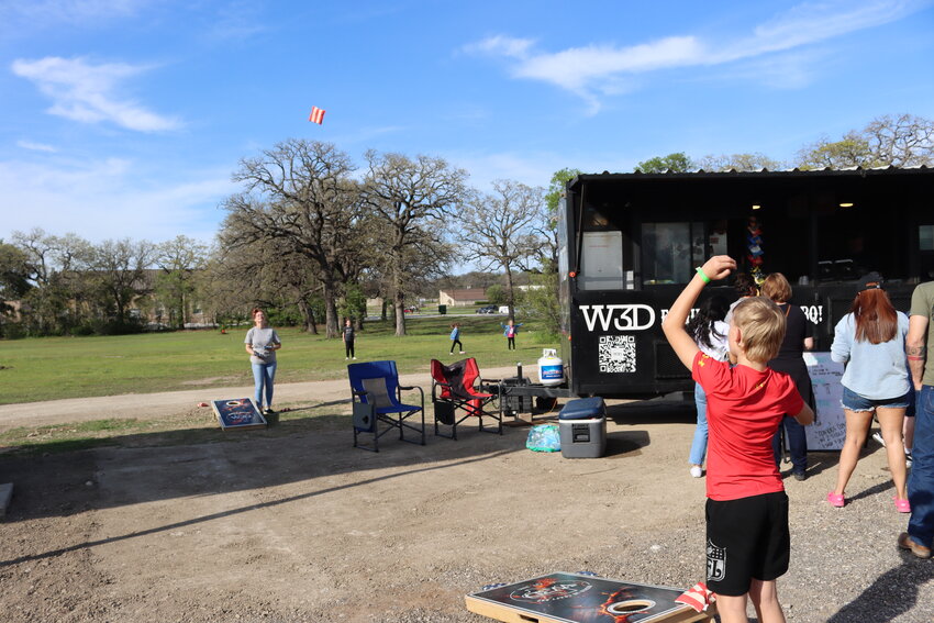 Along with food trucks and music, the park also offers covered seating and games like cornhole, encouraging patrons to bring their own yard games as well.