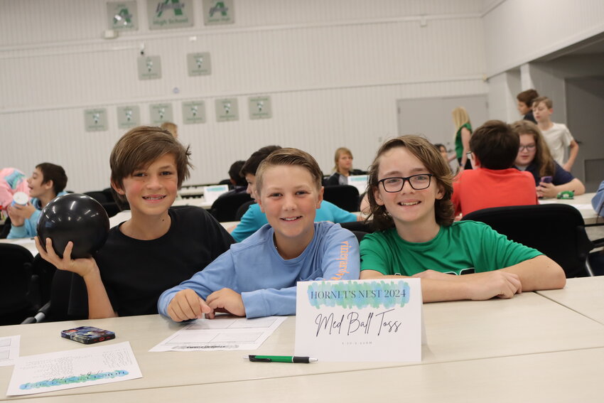 Azle Elementary sixth graders Tyler McWarden, Owen Smith, and Dylan Mooreland promised “fun without the run” by designing an exercise game where players throw a medicine ball.