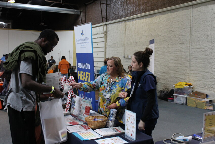 Health professionals consult with visitors at 404 Main Place during 2023’s Primaveral Health Fair.