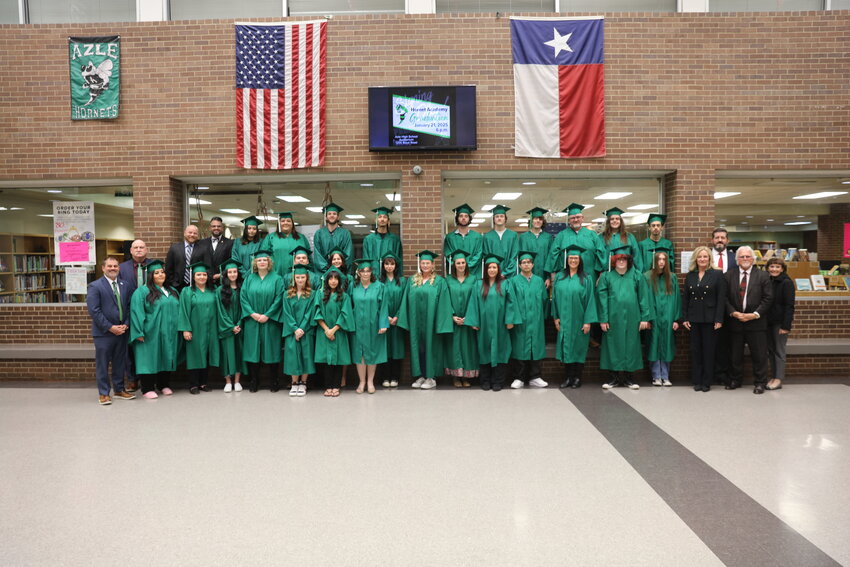 Hornet Academy graduates, Azle ISD trustees and administrators gather for a group photo.