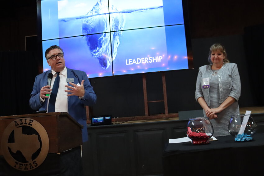 Jack Bradshaw and Angie Akmakjian of the North Tarrant Chamber speak in Azle to promote Leadership North Tarrant at a March 4 luncheon.