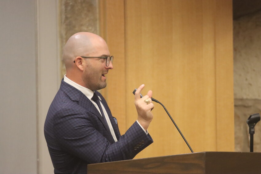 Director of Secondary Curriculum and Federal Programs Jordan Thiem presents the district’s middle of year data at an Azle board of trustees meeting Feb. 24.
