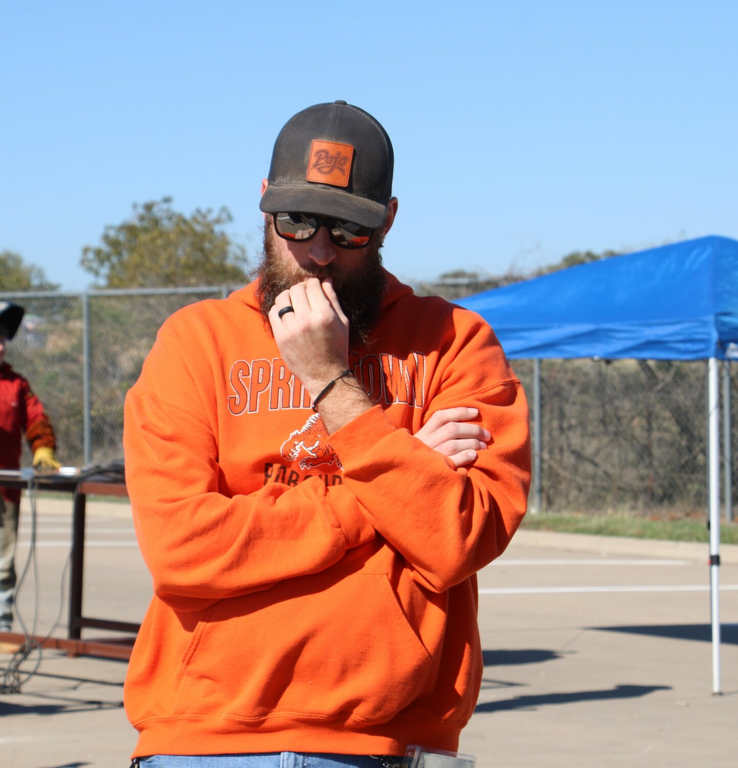 Springtown High School lead welding teacher James Young watches his students finish their table at SHS’ welding competition earlier this month at Porcupine Stadium.
