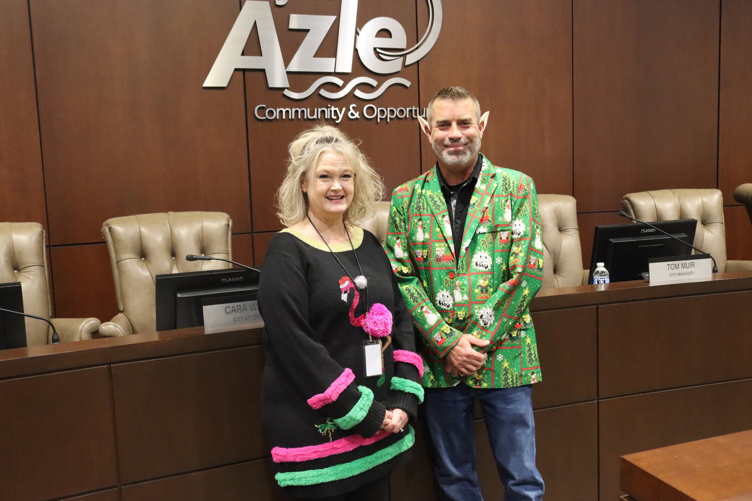 Purchasing agent Jennifer Walls and Azle Mayor Alan Brundrett showed holiday cheer in their outfits during the Dec. 18 meeting.