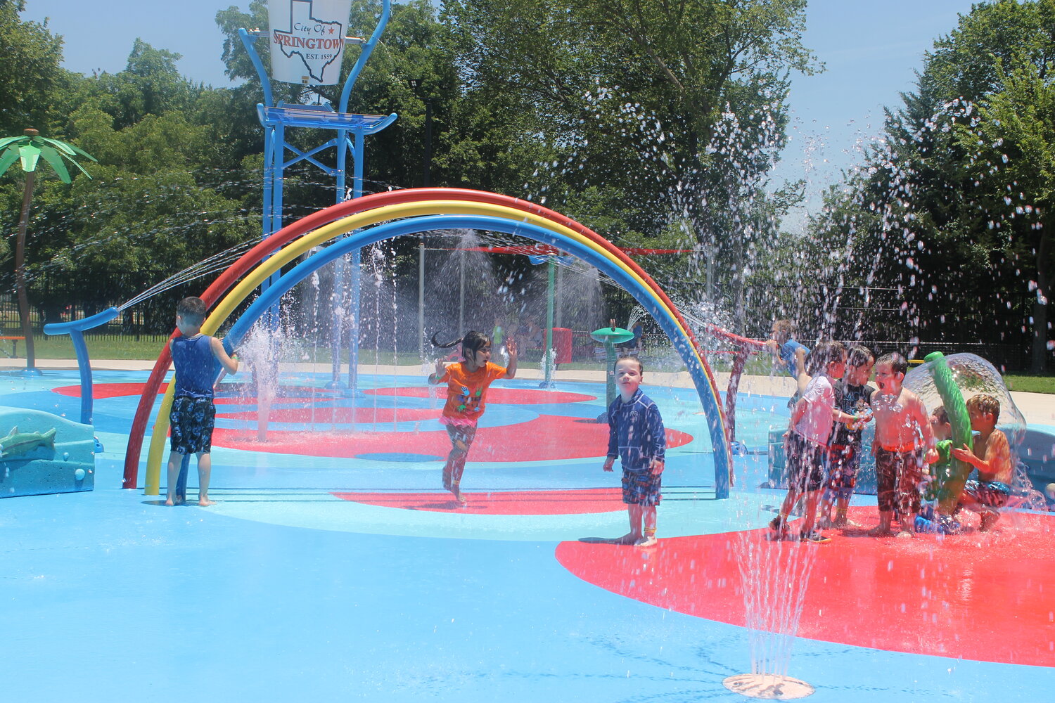 Children play in Springtown’s splash pad. The splash pad operated 2014-16 and has been closed since the 2017 season.