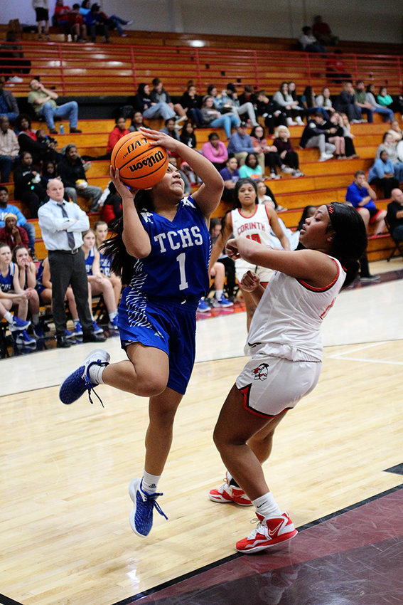 Zareli Ozuna shoots for two of her 21 points against Corinth Tuesday night. The TC girls won 61-25.