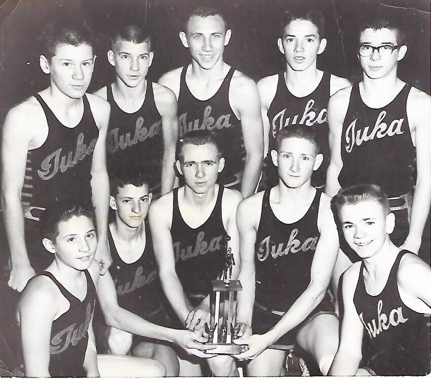 February 14, 1963 - Best in County:
Iuka B-boys proved to be best in their category when
they racked up a winning score over Tishomingo B-Boys and won the
second county basketball trophy for Iuka Schools. Pictured with the
trophy are: Bottom row, left to right, Sonny Gravett, Richard Dexter,
Billy Middleton, Jerry Berryman and Ronnie Walker. Top row, from
left, Harry Adams, Johnny Arnold, Larry Parker, David Rhodes and Harold Lomenick