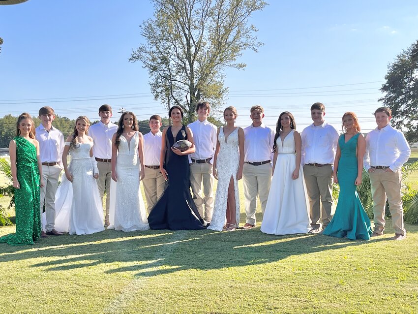 Burnsville Homecoming Court: 7th-grade maid, Maddi Talley, and escort, Jake Trickey; 8th-grade maid, Kalyn Hammrick, and escort, Bryson Westbrook; 8th-grade maid, Shelby Wallace, and escort, Harper Whirley; 8th-grade maid and Football Sweetheart, Kylie Studdard and escort, Chance Pounds; Homecoming Queen, Maggie Jones, and escort, Luke Qualls; 8th-grade maid, Lilly Edge, and escort, Carson Wilkins; and 7th-grade maid, Bailey Wilson, and escort, Jonah McDuffy.