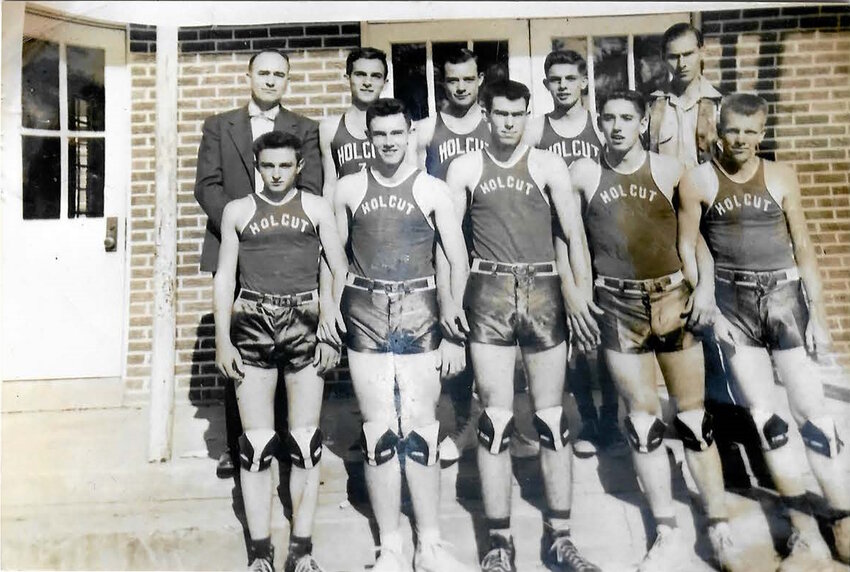 This is a Surviving Photograph of the Holcut Basketball Team. Names of the Pictured are Below.