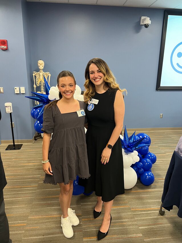Pictured with Abigail is Dr. Mary Piscura, VCOM Professor and co-founder of a nationwide anatomy outreach initiative, the Anato-Bee. The group includes all of the Anato-Bee finalists.