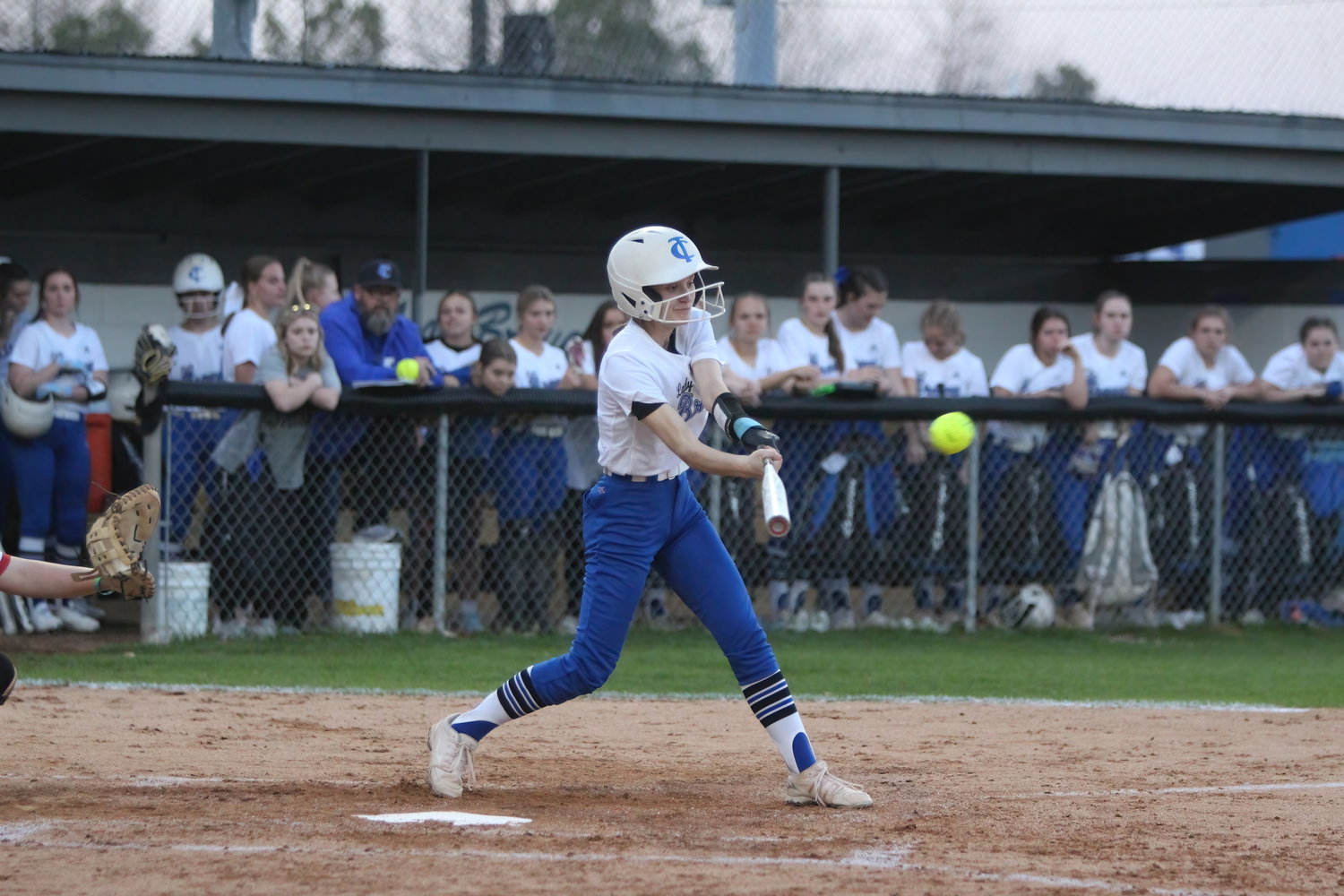 Madelyn Long hits a double, clearing the loaded bases.
