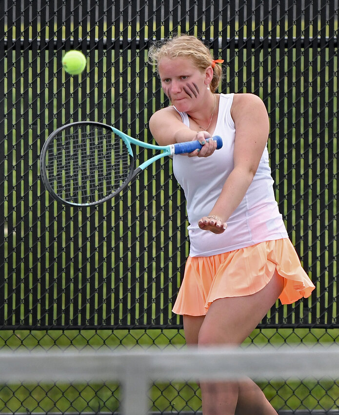 No. 3 singles senior Jerica Nier uses a forehand return during her match at Tuesday evening's regional at NorthWood...Nieter
