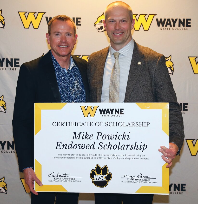 Dr. Ron Holt (left) established the Mike Powicki Endowed Scholarship at Wayne State College in honor of Powicki, who received the Community Service Engagement Award during the Dr. Ron Holt Civic Engagement Award dinner April 25 on campus.