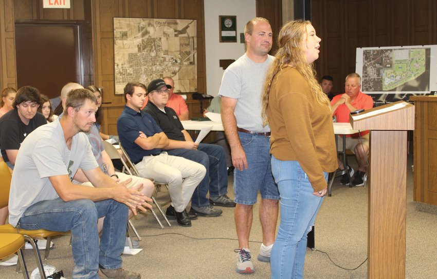 Travis Rasmussen (left) and Anaka Brasch were introduced as new members of the Wayne Volunteer Fire Department by Jordan Widner, Assistant Fire Chief, at Tuesday's City Council meeting.