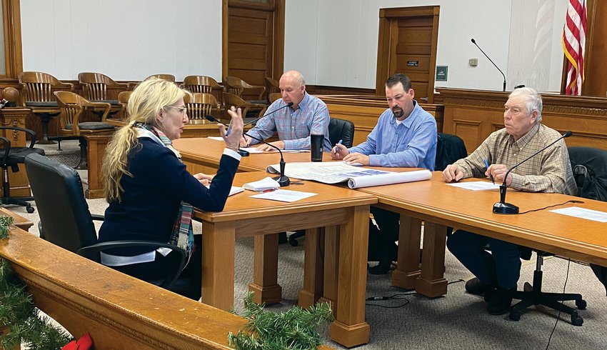 Jill Brodersen (left) discussed window replacement at the courthouse during Tuesday's meeting