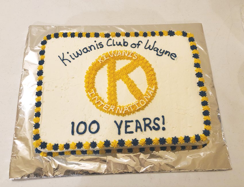 A special cake for the 100th anniversary was served at last week's Chamber coffee.