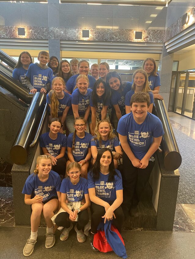 Fifth and sixth grade students at Wayne Elementary School who served as tellers for the State Nebraska Bank &amp; Trust Blue Devil Branch posed for a photo at the end of the school year. The group was able to tour the Omaha branch of the Kansas City Federal Reserve and learn more about banking.