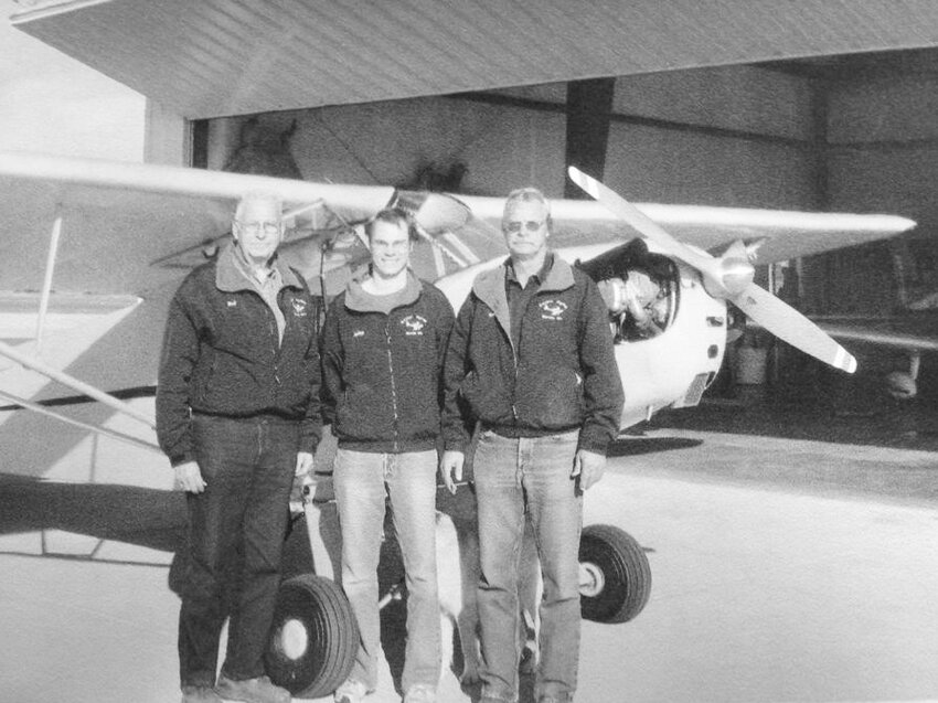 Three generations of Beckers have continued the growth of Becker Flying Service. Bud Becker (left) started the company in 1948. His son Tom (right) is the current owner and his son, John (middle), works for the company as the chief pilot for aerial spraying.