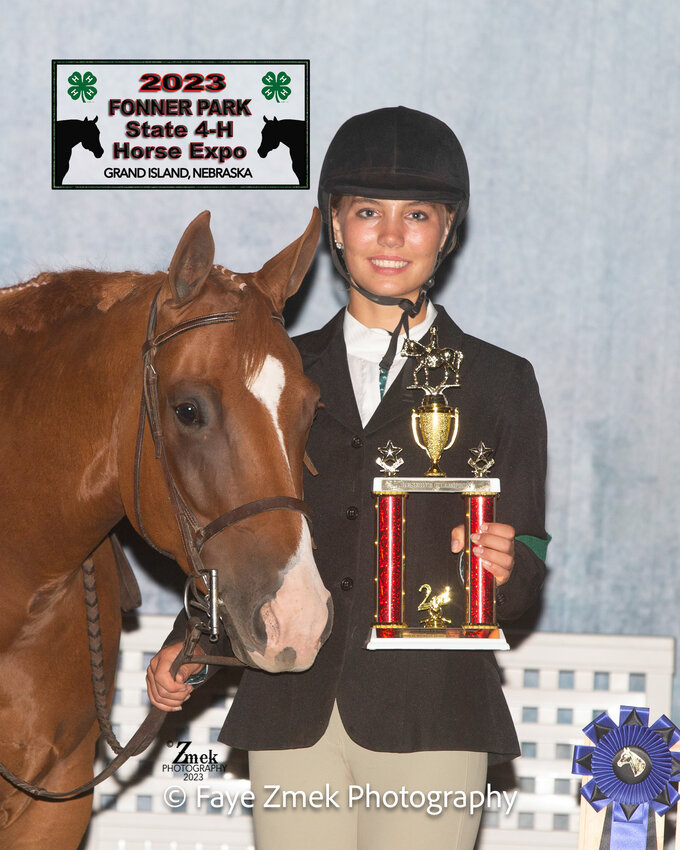 Kate Hill, 17 of Wayne and her AQHA mare Look Whos Luna were the Reserve Champions in the Senior Hunter Under Saddle class at the Fonner Park State 4-H Horse Expo.  Kate is a member of the Country Classics 4-H Club and the daughter of Karen Longe and Mark Hill.