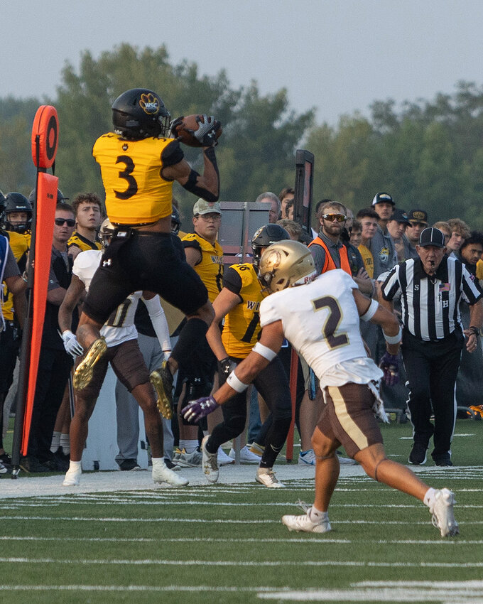 Kendrick Watkins-Hogue goes up to catch a pass during the first half Wayne State&rsquo;s 49-10 win over Southwest Minnesota State.