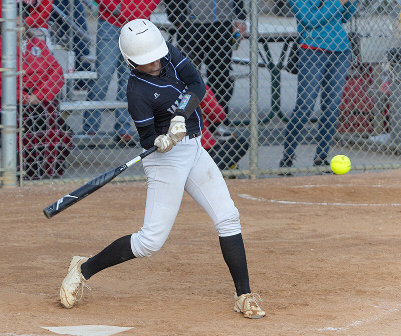 Wayne senior catcher Jersi Jensen had one of two base hits for Wayne in Wednesday&rsquo;s 8-0 loss to Bishop Neumann in the opening round of the Class C State Softball Championships in Hastings. (Photo by Michael Carnes)
