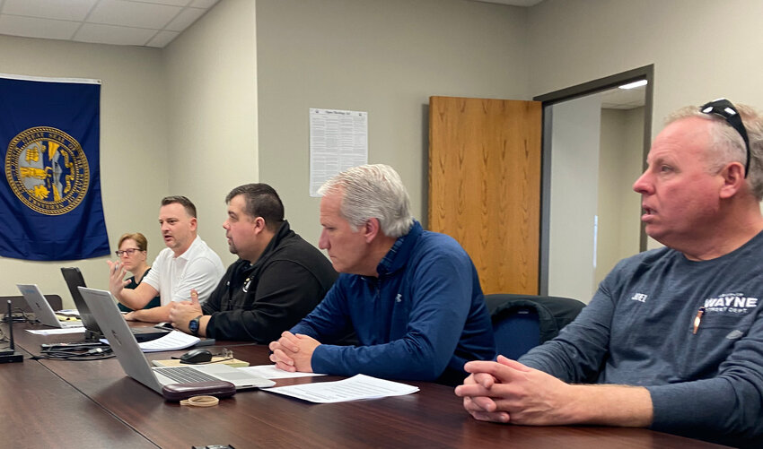 From left to right, Dawn Duffy, Ryan Poots, Nic Kemnitz, Marlen Chinn and Joel Hansen discuss the upcoming pictometry imagery mapping. Each county and city representative highlighted their department's respective use for the imaging.
