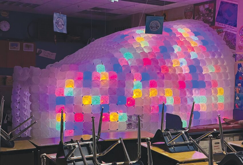 This year's igloo is complete with colorful lights inside for the students to enjoy.