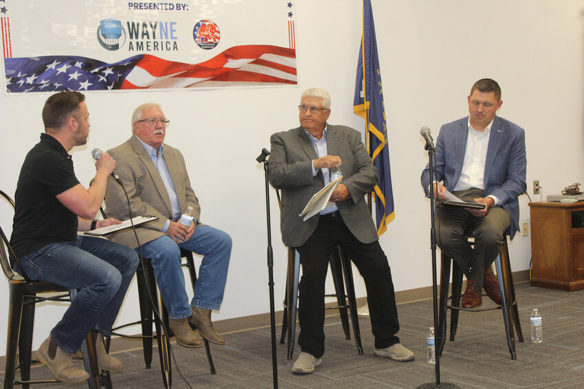 Breland Ridenour (left) and Luke Virgil (far right) moderated the Candidate forum that involved Legislative District 17 candidates Glen Meyer and Mike Albrecht.