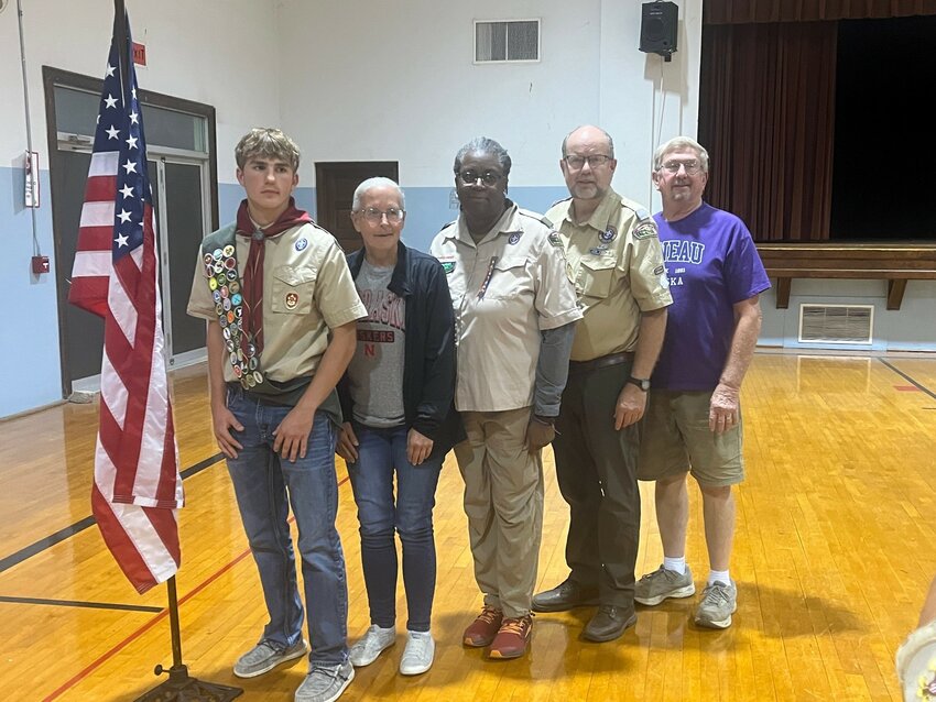 Taking part in Caleb's Court of Honor were (left) Caleb Erwin of Laurel, Caleb Michelle Carlson of Winside, Michelle Mark of Wayne, Pat Sukup of Norfolk and Gene Barg of Winside.