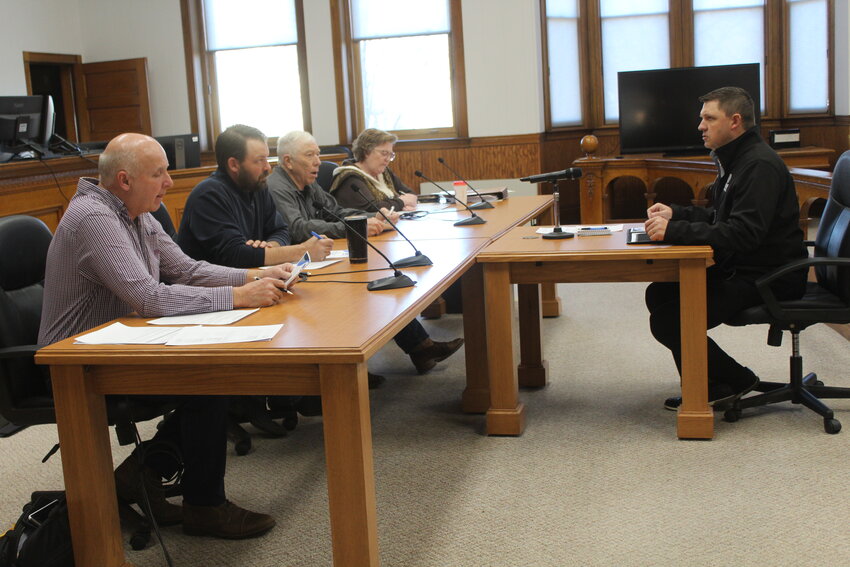 Luke Virgil (right) shared a quarterly update on Wayne America, Inc. activities with Wayne County commissioners.