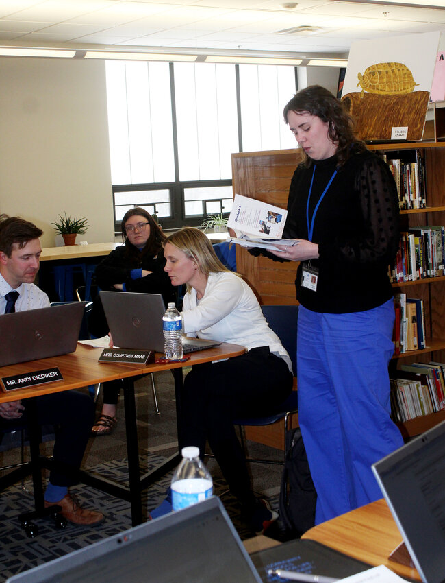 Elementary Library Director Sarah Oltjenbruns talked about the activities that take place each week at the elementary library.
