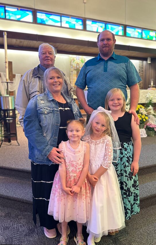 Four generations of the Dorcey family, all who have attended St. Mary's Elementary School, gathered for a photo. They include (front) Ryleigh and Harper; (middle) Jerrae and Alina and (back) Jerry and Ben.