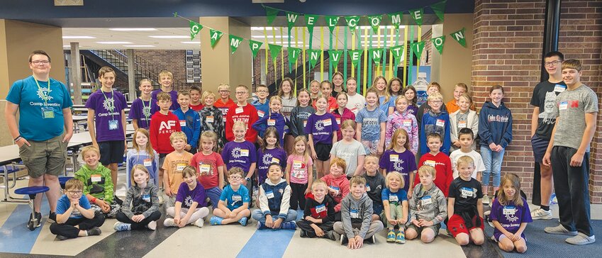 Those taking part in this year's Camp Invention at Wayne High School pose for a photo to kick off the week-long camp. Camp attendees include a number of interns who have previously attended the event as participants.