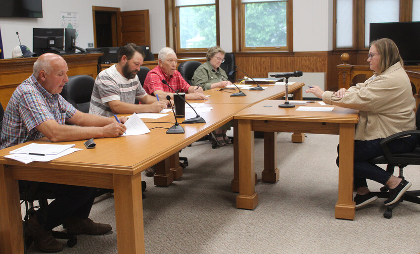 Sandra Hansen (right) presented an update on the status of ARPA funds spent in Wayne County during Tuesday's meeting of the Wayne County Board of Commissioners.