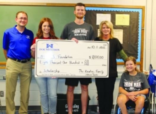 Involved in a check presentation to the Wayne Community Schools Foundation were (left) Brandon Foote, Morgan Keating, Zach Keating, Tracy Keating and Ande Schulz.
