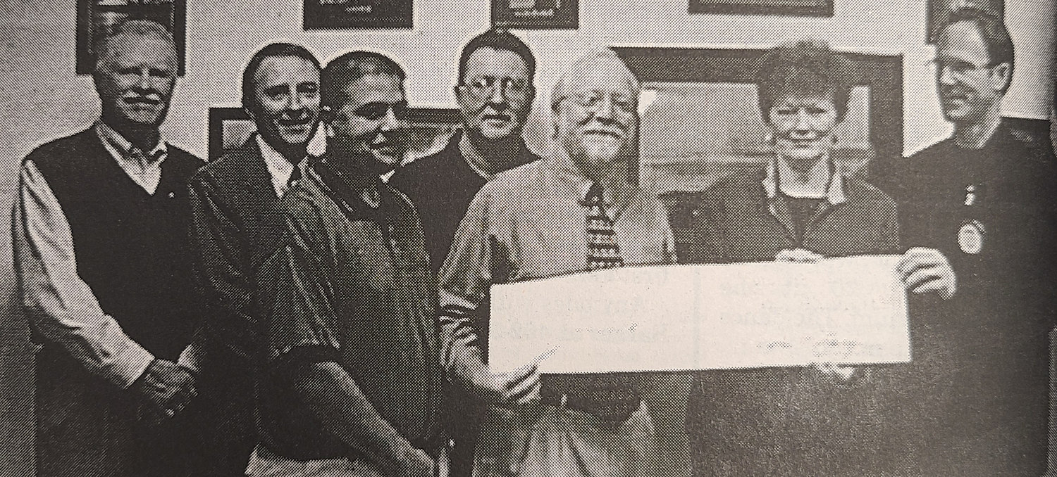 10-11-2001 - The Wayne Rotary Club presented a check for $5,000 to Habitat for humanity members Jeff Carstens and Ann Witkowski at the Oct. 10 meeting.