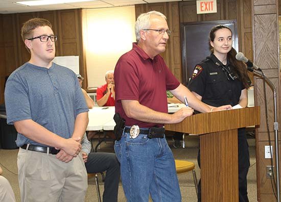 Wayne Police Chief Marlen Chinn (center) introduced Devan Henschke (left) and Megan Mandeville as new employees with the police department during Tuesday's council meeting.