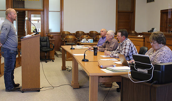 Scott Sievers (left) discusses the Second Amendment Sanctuary County Declaration during Tuesday's meeting of the Wayne County Board of Commissioners.