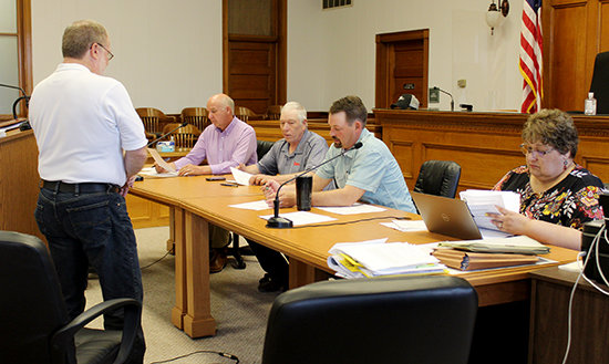 Doug Elting with Berggren Architects discuss work on the courthouse renovation project with commissioners at Tuesday's meeting.