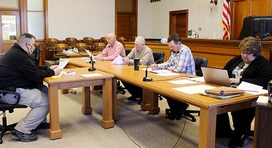 Emergency Manager Nic Kemnitz (left) updated Wayne County Commissioners on work he has been doing in recent weeks.