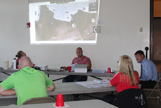 Council members discuss the options for a fence in the Western Ridge subdivision.