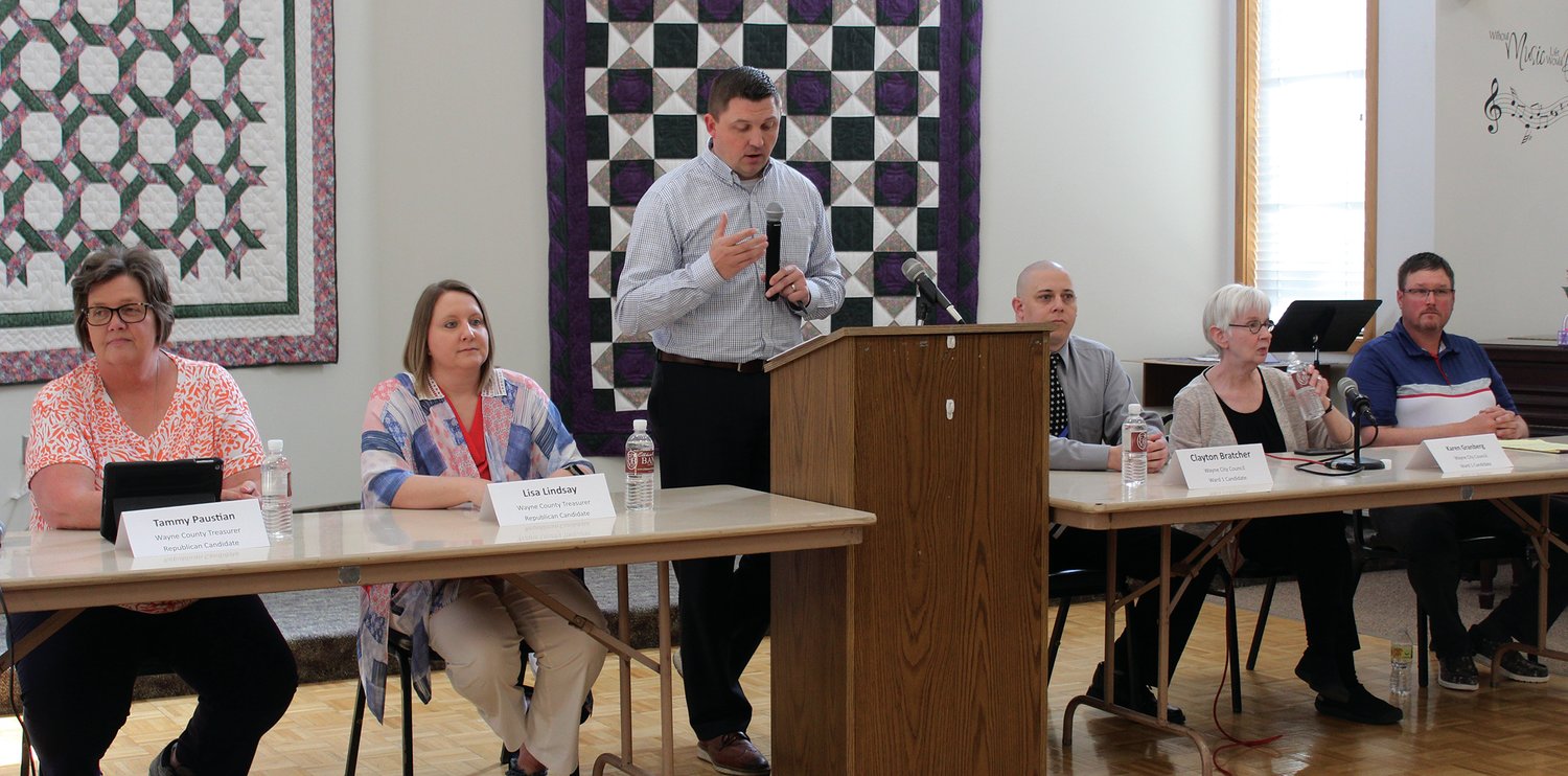 Wayne Area Economic Development Director Luke Virgil asks candidates questions during Tuesday's Candidate Forum. They included (left) Tammy Paustian, Lisa Lindsay, Clayton Bratcher, Karen Granberg and Chad Sebade.