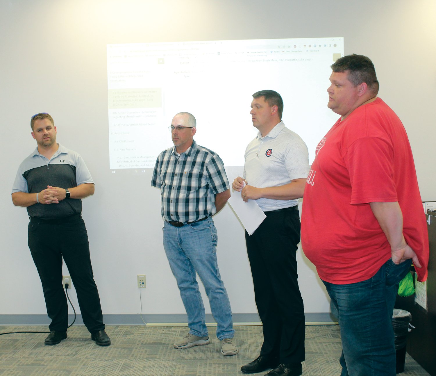 Wayne Business & Industry members John Vinchattle (left), Broch Muhs, Luke Virgil and BJ Woehler talked about the benefits of a Skills USA program during the Board of Education meeting.