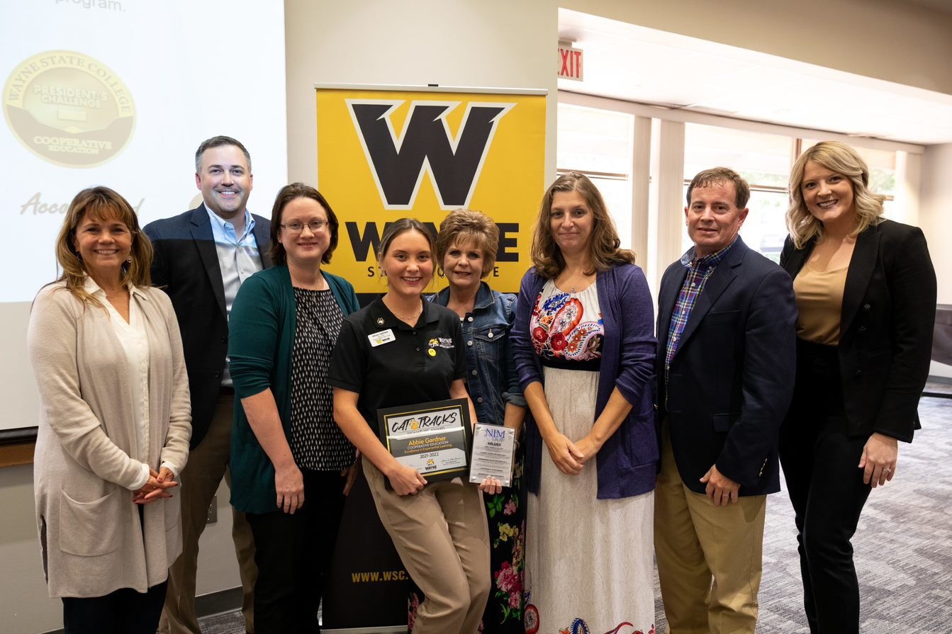 Abbie Gardner, a Wayne State junior studying accounting, received the 2021-2022 Excellence in Experiential Learning Award at a mixer held Sept. 14. Pictured, from left, Joey Patterson, Brad Noel, Julie Johnson, Abbie Gardner, Lori Langston, Kelly Gall, Jeff May and Kira Buol.