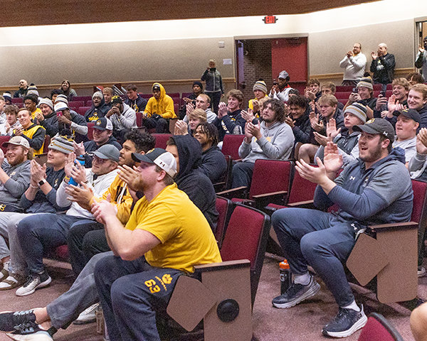 The Wayne State football team applauds after seeing their name show up on the bracket during Sunday’s announcement of the 28-team field for the NCAA Div. II playoffs. The Wildcats are the sixth seed in Super Region 4 and will play at Minnesota State on Saturday.