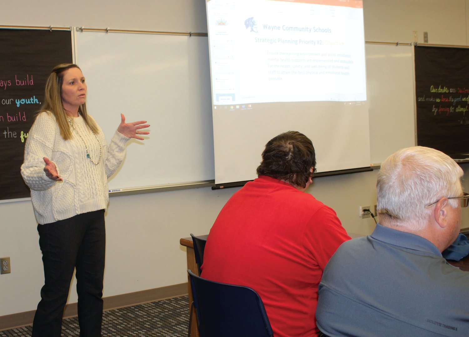 Dr. Casey Hurner with Nebraska MTSS (left) discussed the MTSS program during Monday's school board meeting.