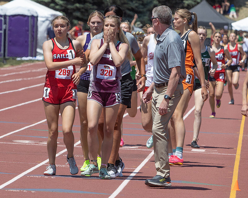 Jordan Metzler of Wakefield is emotional after winning the Class C 800-meter title at the Nebraska State Track and Field Championships. Her winning time was a new state record.